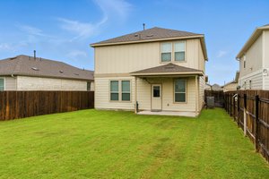 A side view of the backyard.