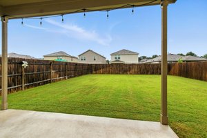 There's plenty of room for a pool or garden in this huge backyard that also includes a sprinkler system.