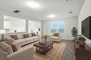 Virtually staged family room to demonstrate how spacious this room is.