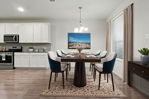 Virtually staged dining rea.