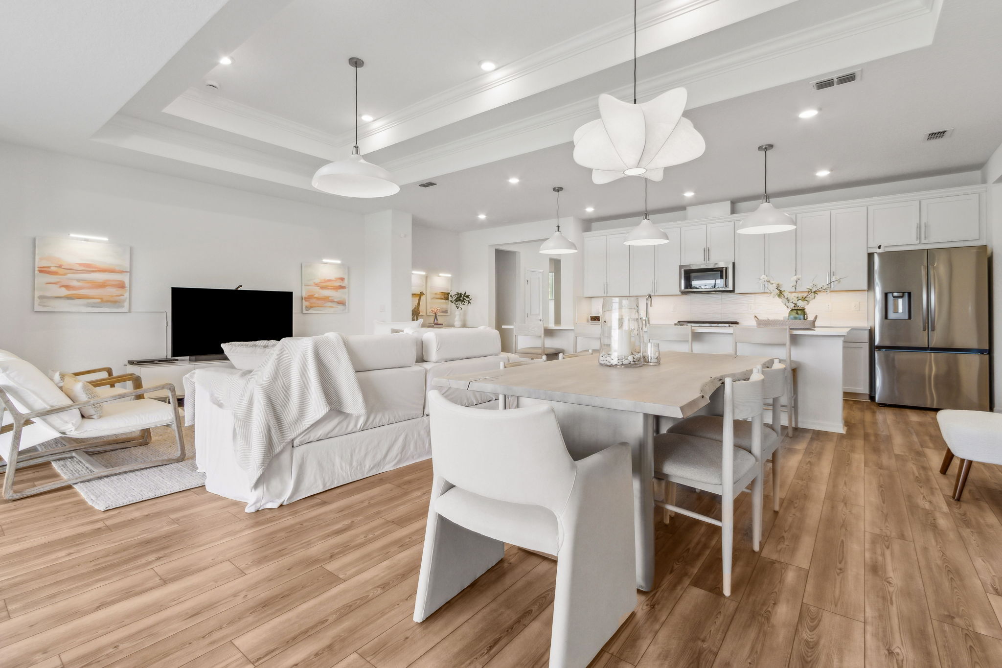Transition effortlessly from kitchen to dining to living area. ...