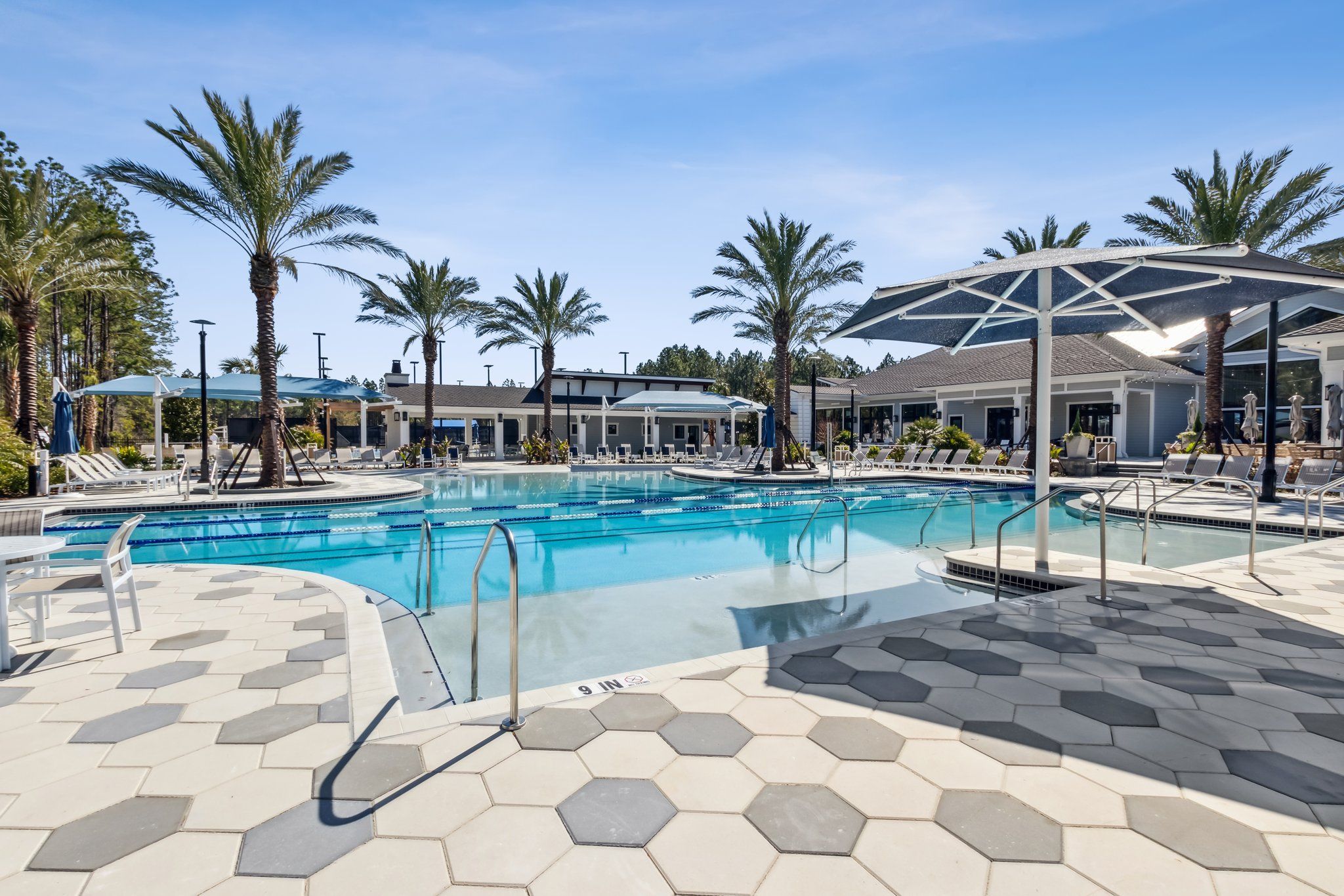 The upscale community pool rivals those found at top-tier resorts....