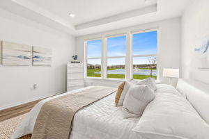 With a wall of windows framing the scenic pond ...