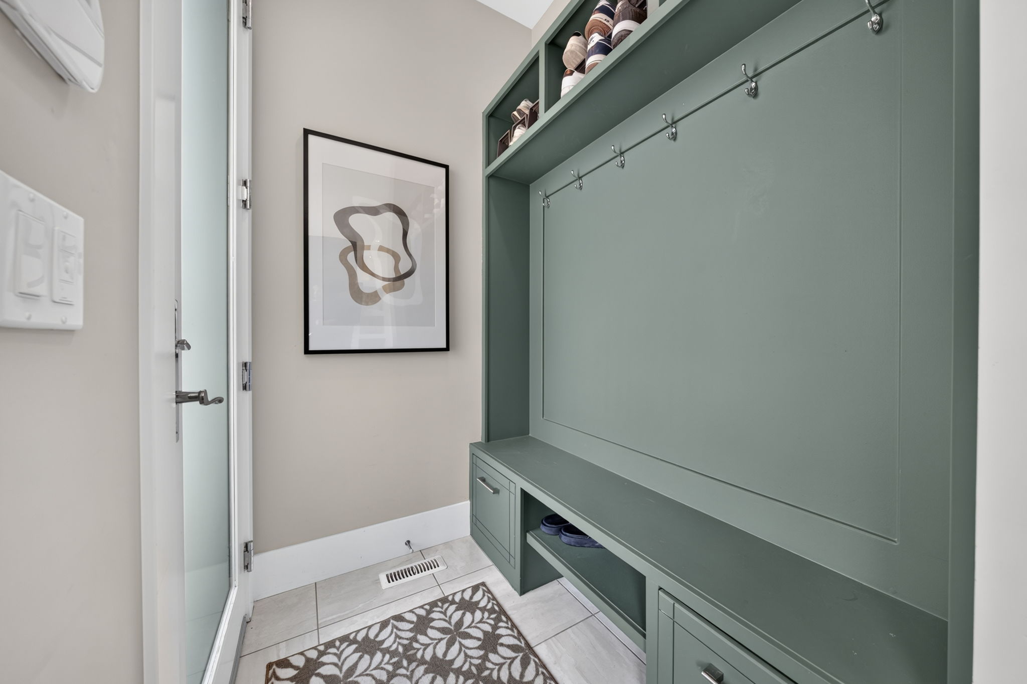 Custom mudroom built-ins off the rear entry