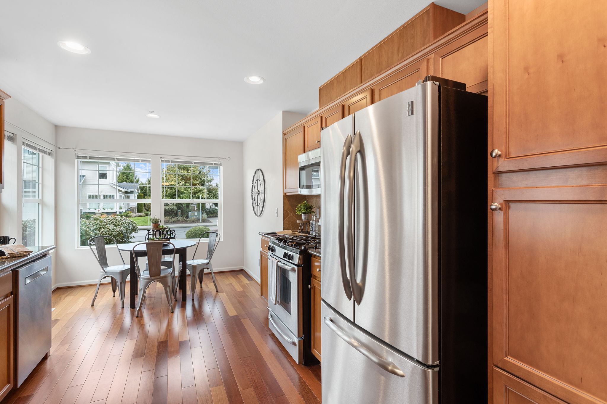 Stainless Steel appliances and built in pantry in the kitchen