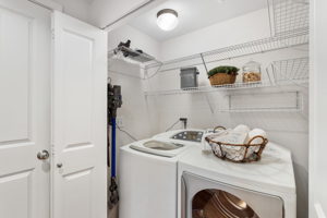 Laundry on main floor, oversized washer & dryer convey with home!