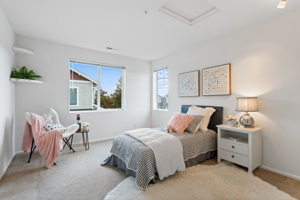 1 of the 2 upstairs bedrooms, bright and light!