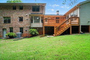 Back of House with Deck & Sun Room View