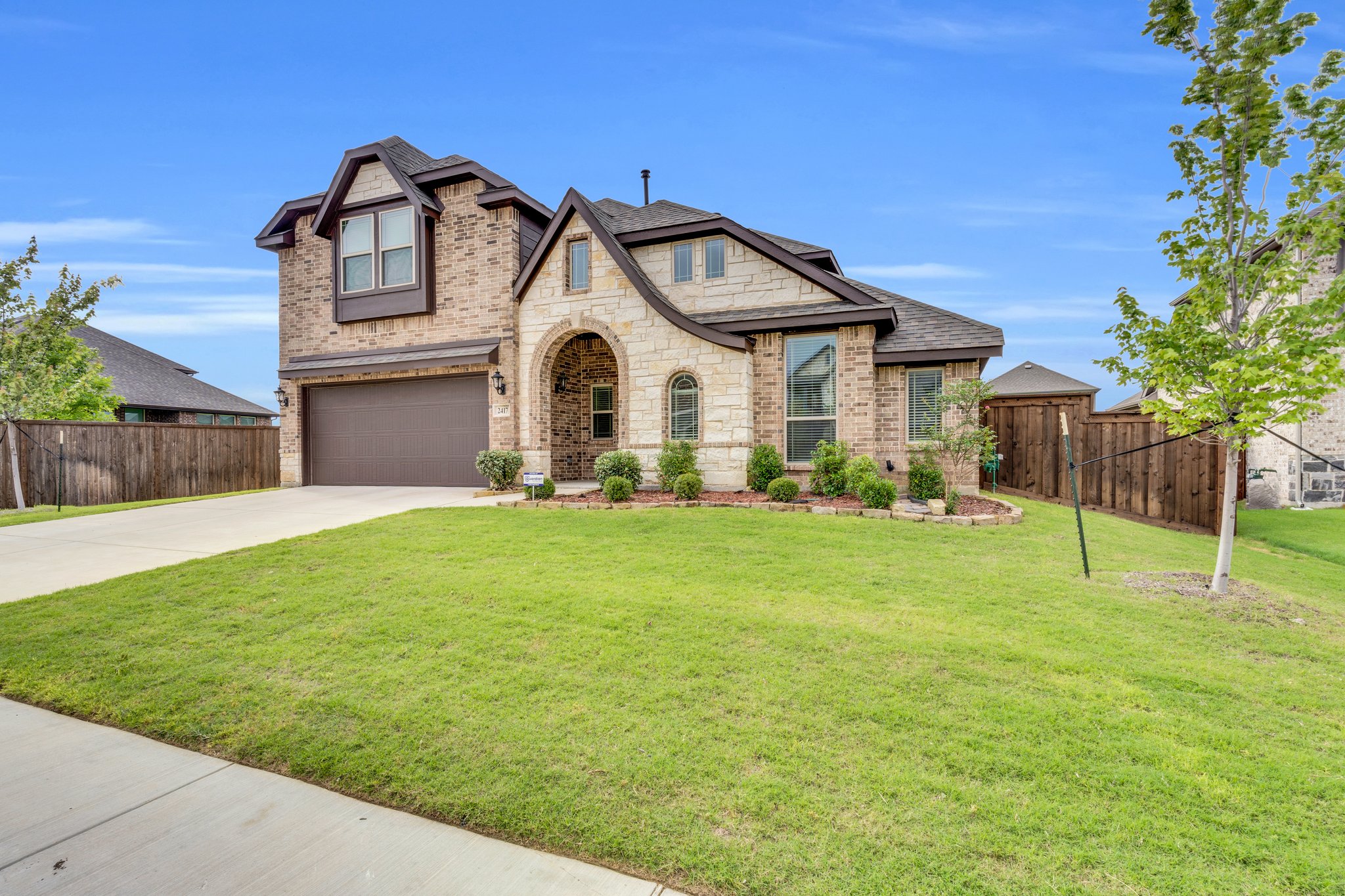 This home is complimented with a 2-car garage provides extra storage and creates effortless curb appeal