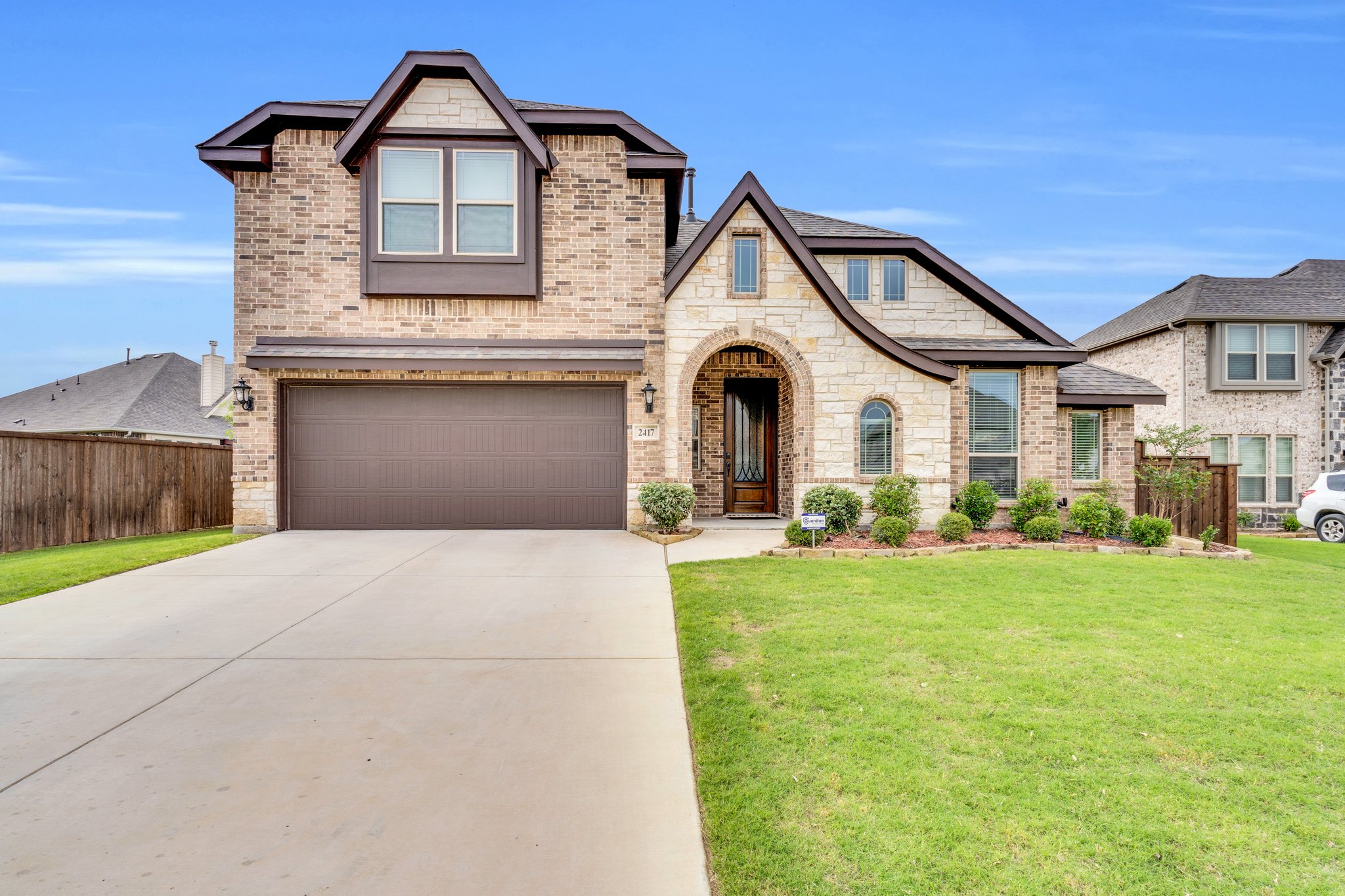 Charming stone and brick façade with gables