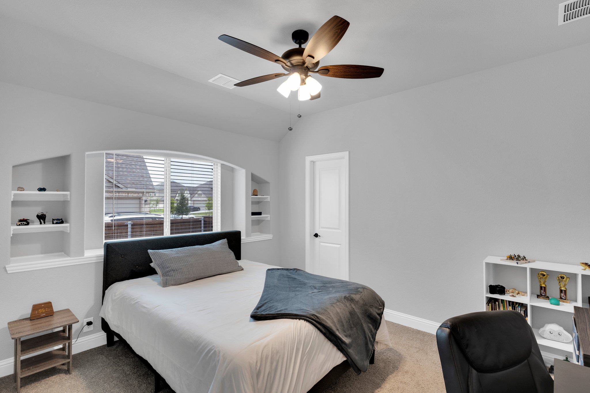 Two secondary bedrooms on the main floor offer multiple sleeping options and arrangements