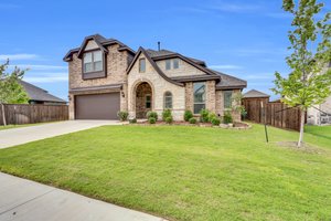 This home is complimented with a 2-car garage provides extra storage and creates effortless curb appeal