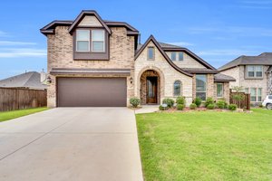 Charming stone and brick façade with gables