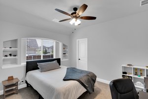 Two secondary bedrooms on the main floor offer multiple sleeping options and arrangements