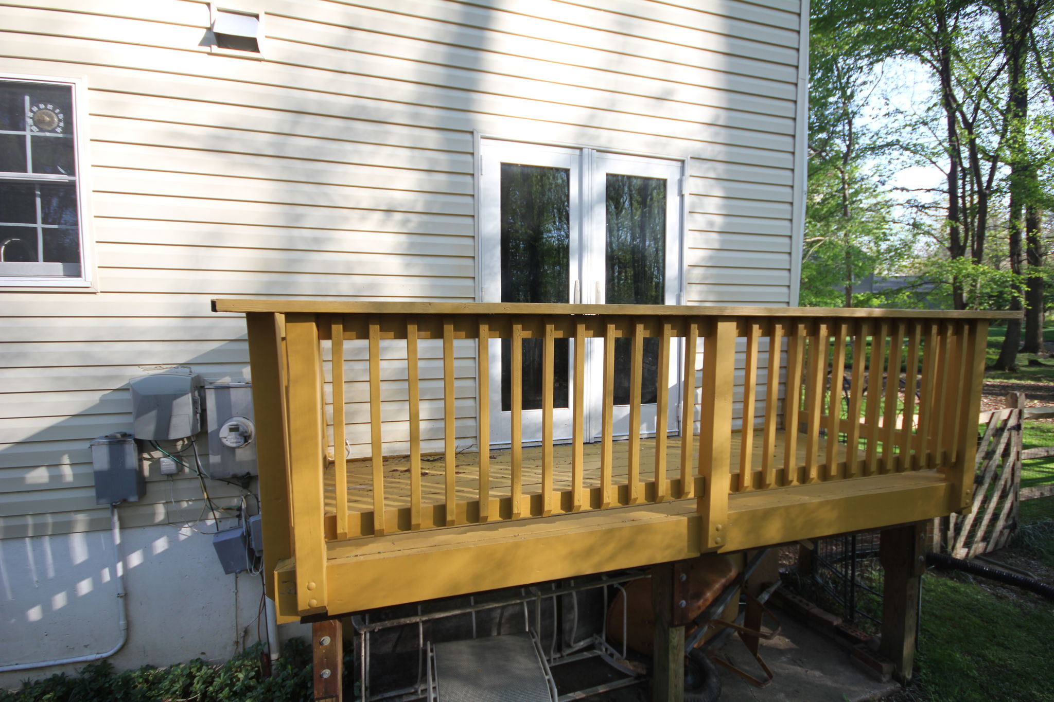 Deck overlooks entire backyard