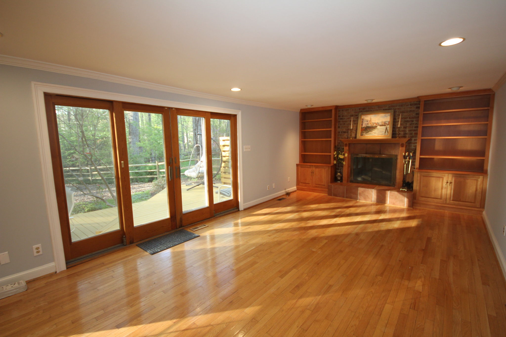 Sunlit family room w/special order Anderson doors