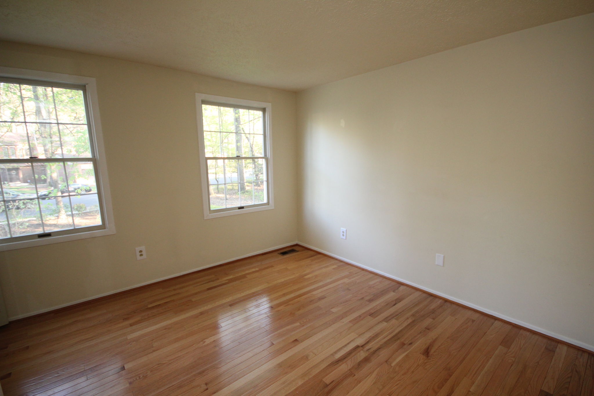 Bedroom 3 with hardwood floors throughout