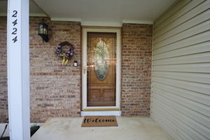 Charming SE facing entryway with warm welcome.