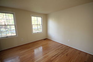 Bedroom 3 with hardwood floors throughout