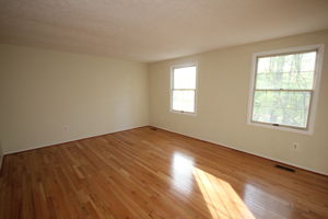 Oversized Bedroom 1 overlooks rear yard