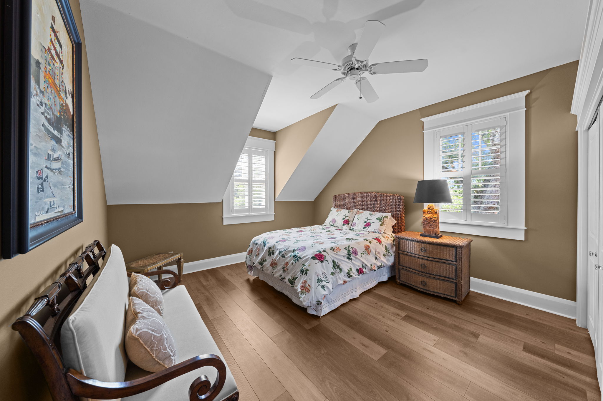 Bedroom 5 is at the end of the hall for added privacy for guests