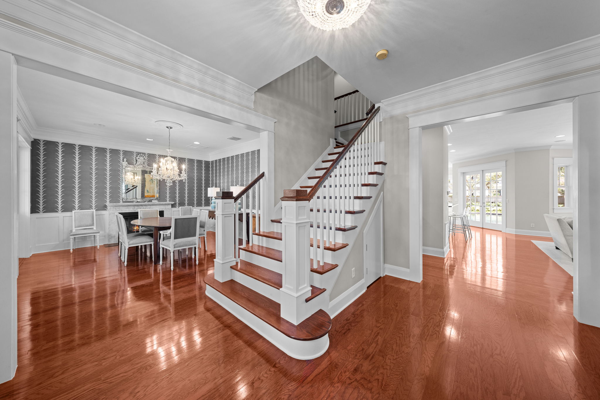 Features include high ceilings, crown molding and wood floors