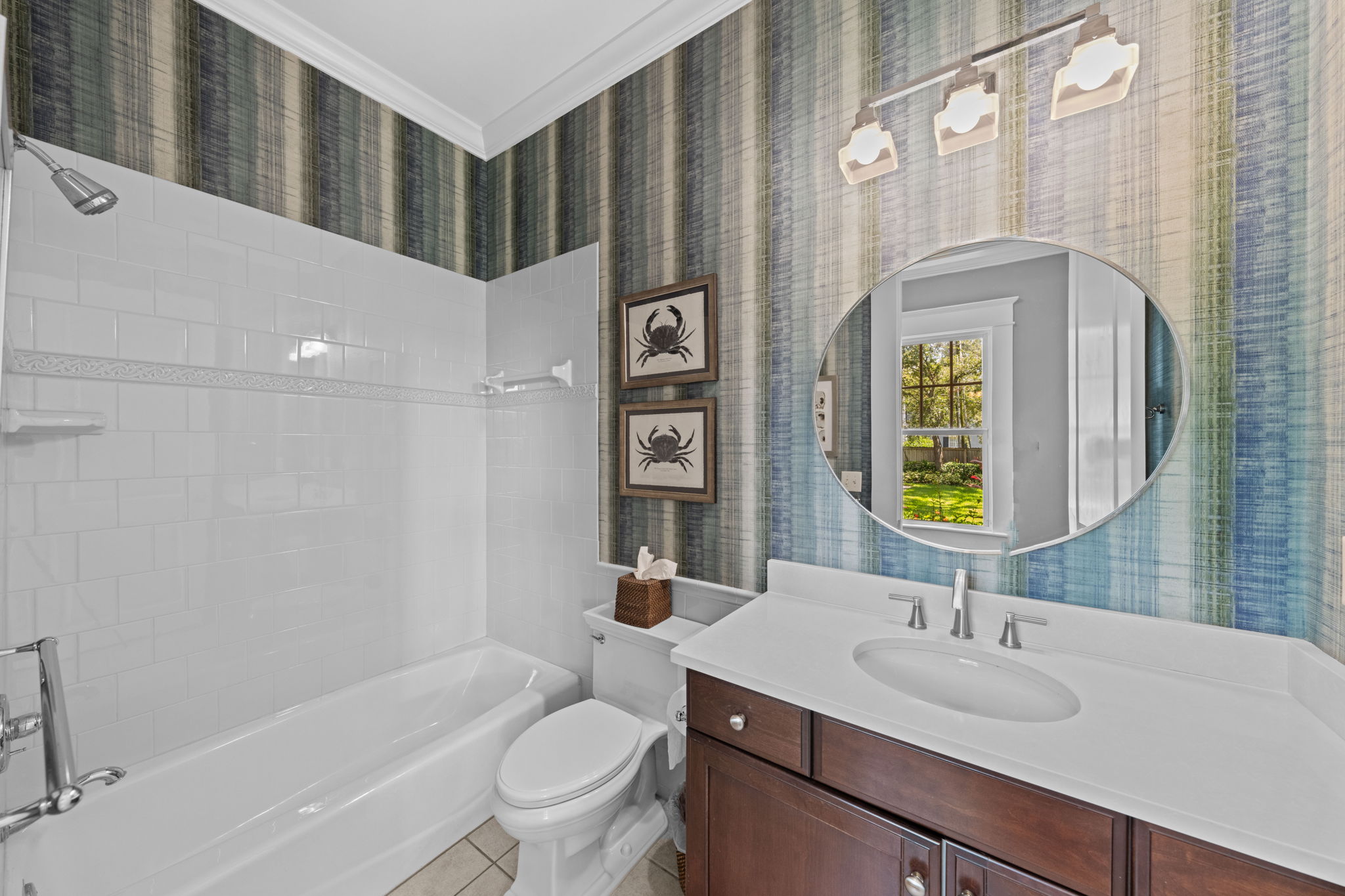 Full bath is accessible from back yard and pool area