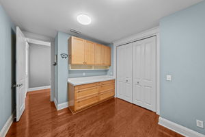 with cabinets and utility closet