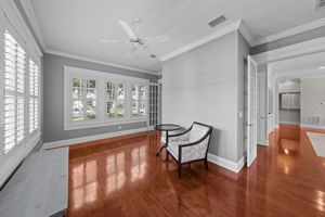 Beyond the study is a sunroom
