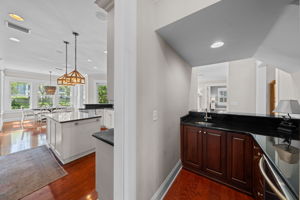 Between the kitchen and dining room find an entertainment wet bar