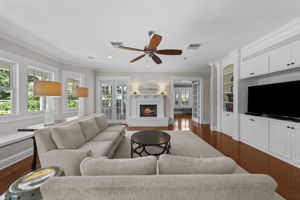 French doors lead to expansive brick rear porch