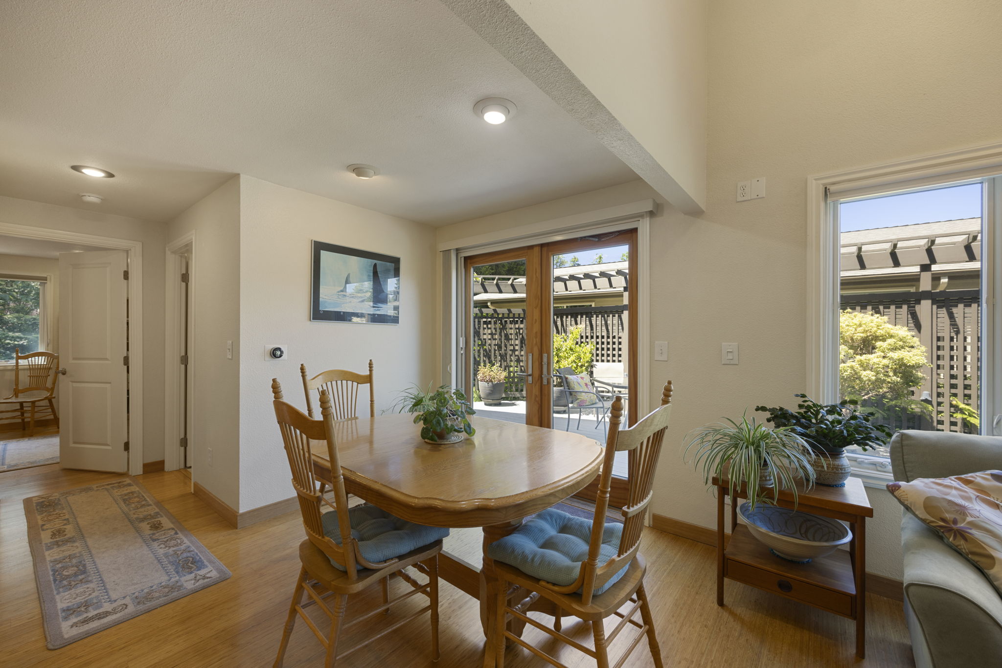 The Primary suite & laundry just past the dining area