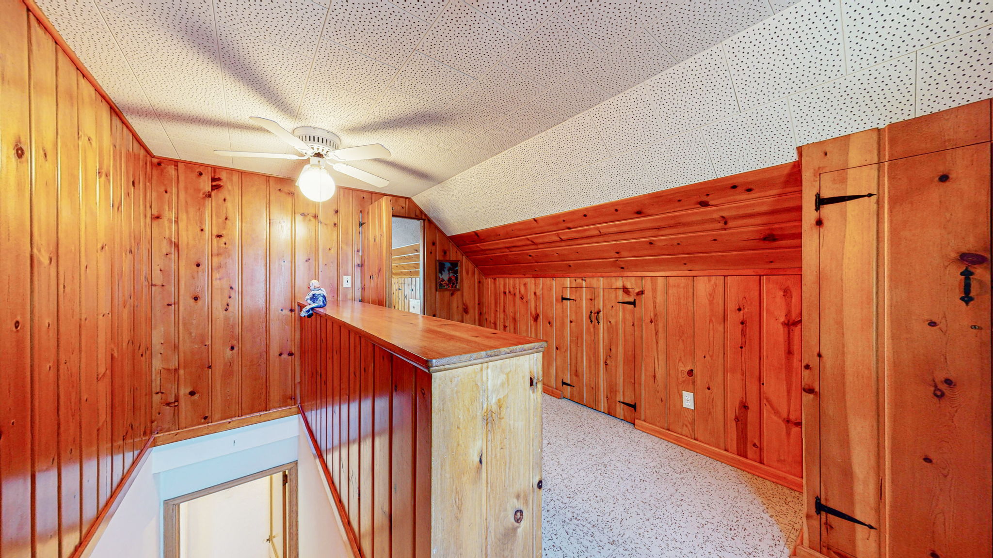 Classic knotty pine upper level awaits your decorating touch