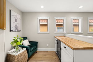 Another upstairs flex space with built in mini fridge