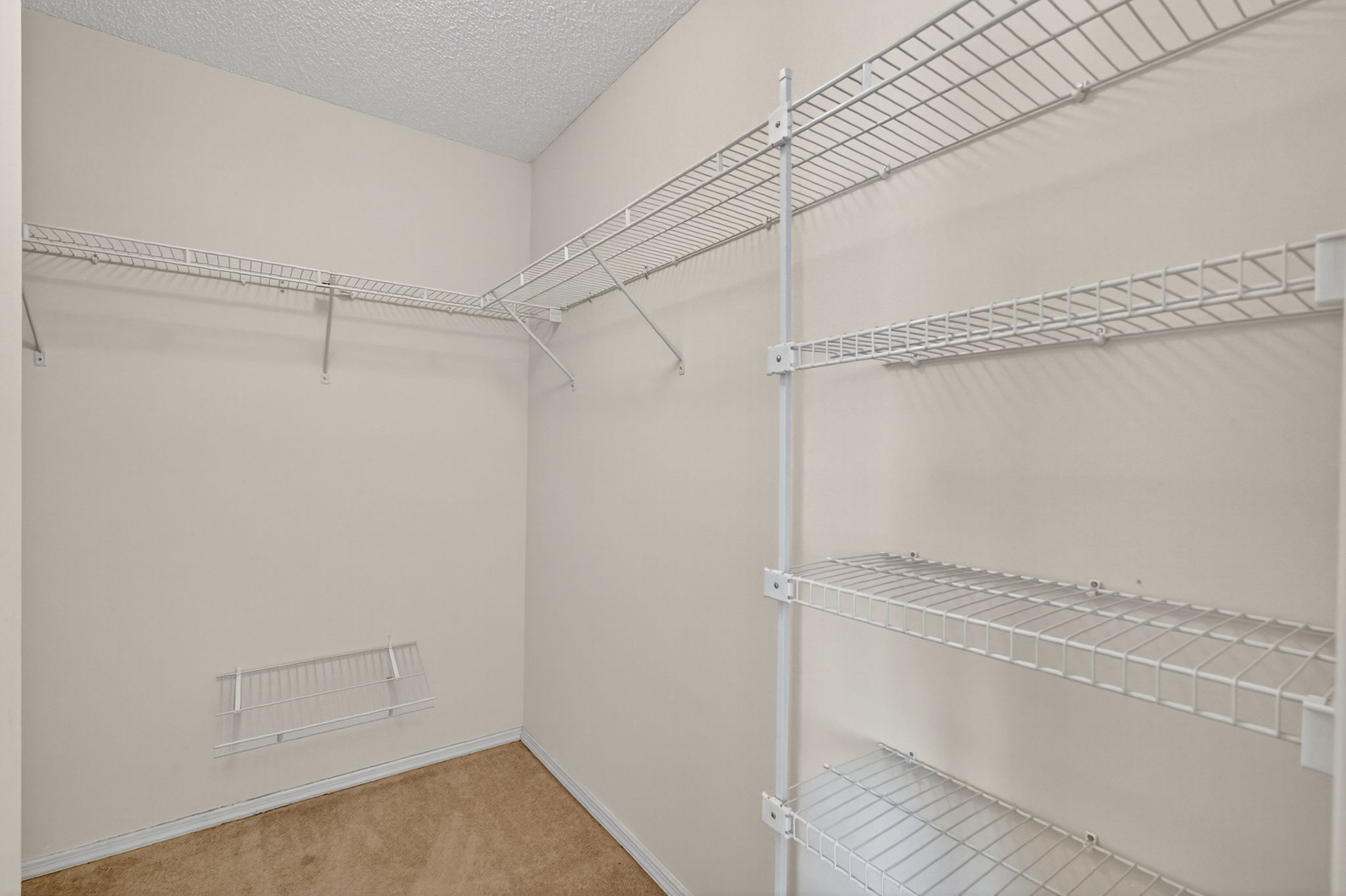 Primary Bedroom Walk-In Closet