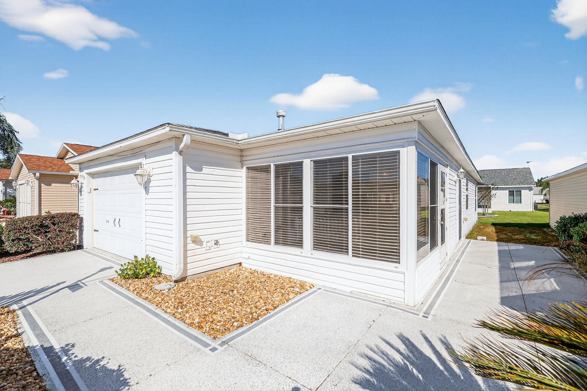 Front/Side Elevation with Patios