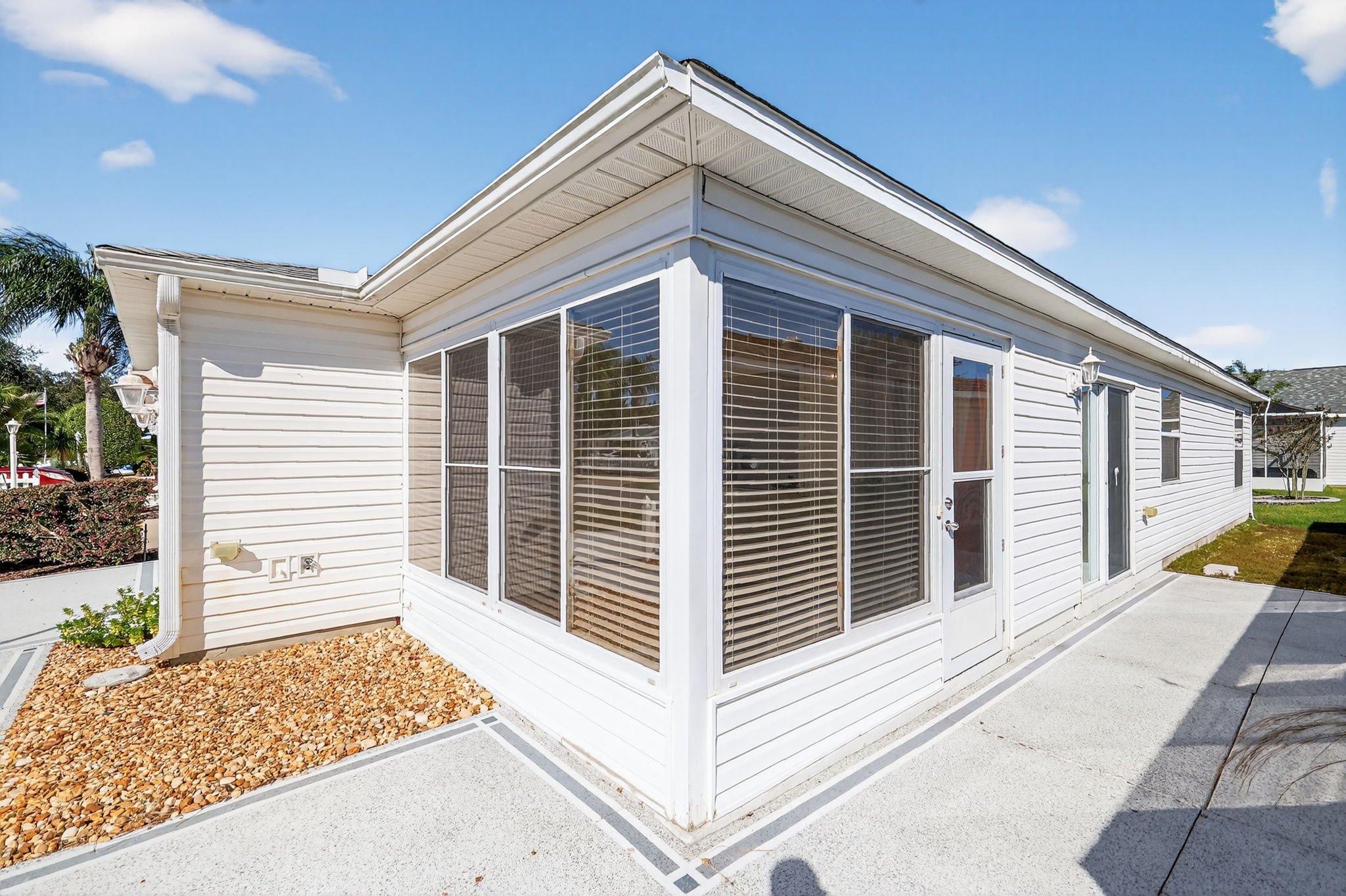 Front/Side Elevation with Patios