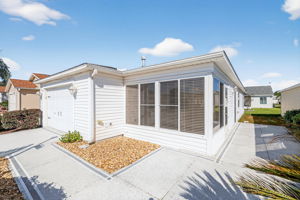 Front/Side Elevation with Patios