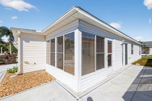 Front/Side Elevation with Patios