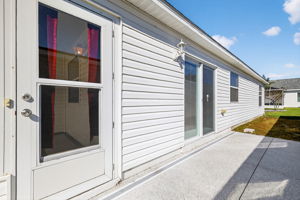 Enclosed Lanai Entry and Side Patio