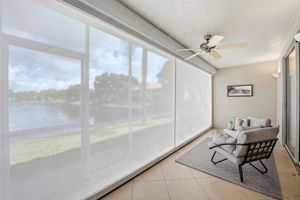 Lanai w/ new electric storm screens and lake/fountain views