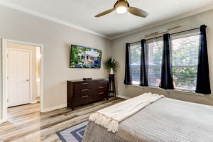 A wall of windows gives the room a bright, airy feel