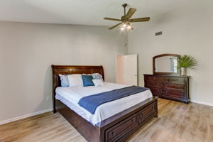 The spacious master bedroom easily fits a king-size set.