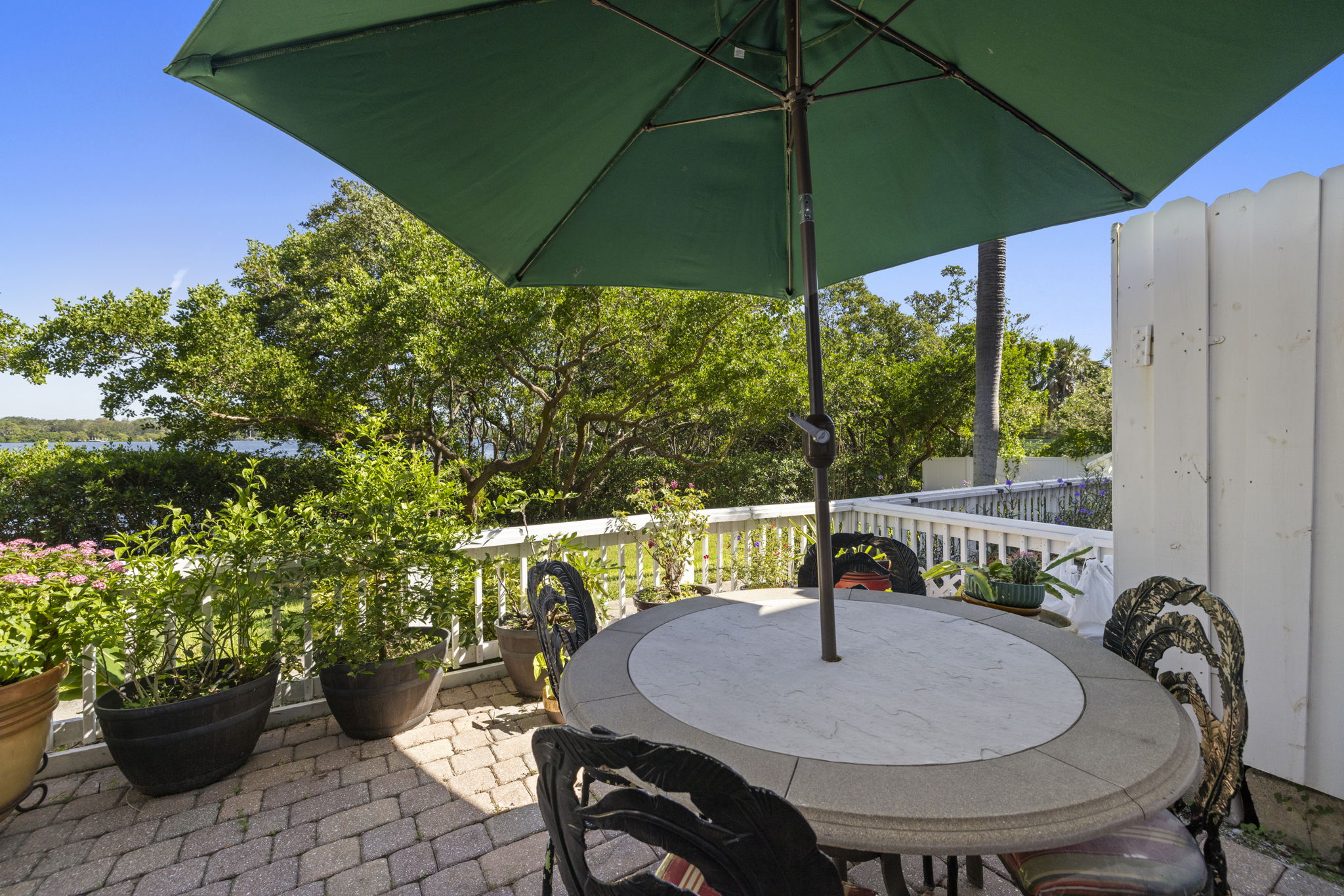 Breathtaking Views** Enjoy daily sights of the Big Bayou, boats, dolphins, and manatees from your oversized covered lanai, finished with pavers and a tongue-and-groove wood ceiling.