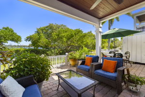 Breathtaking Views** Enjoy daily sights of the Big Bayou, boats, dolphins, and manatees from your oversized covered lanai, finished with pavers and a tongue-and-groove wood ceiling.
