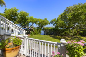Breathtaking Views** Enjoy daily sights of the Big Bayou, boats, dolphins, and manatees from your oversized covered lanai, finished with pavers and a tongue-and-groove wood ceiling.