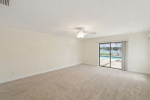 Primary bedroom with views of the pool and Lake Link.