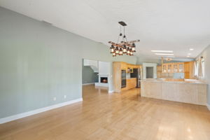 Large dining room space off of the kitchen and looking into the family room.