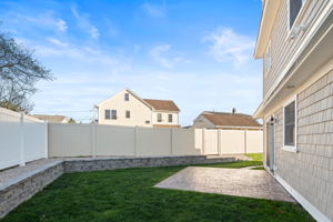 Stamped concrete patio in private backyard