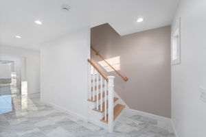 Stairs up from Level 1 to 2 just inside front door